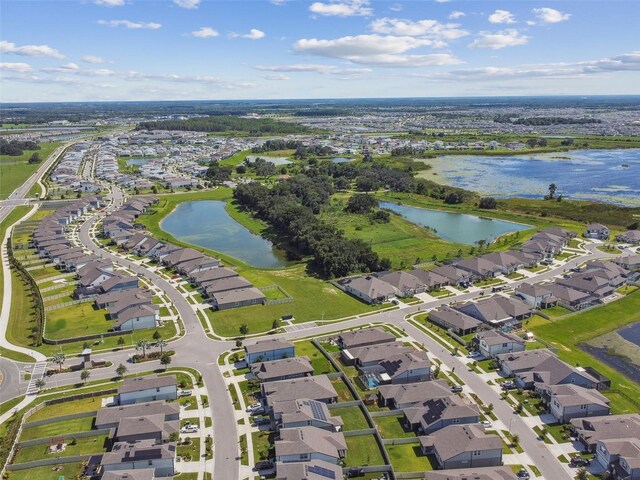 drone / aerial view with a water view