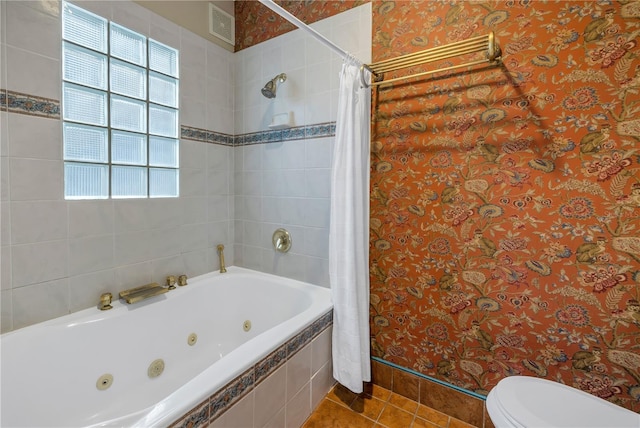 bathroom with tile patterned flooring and toilet