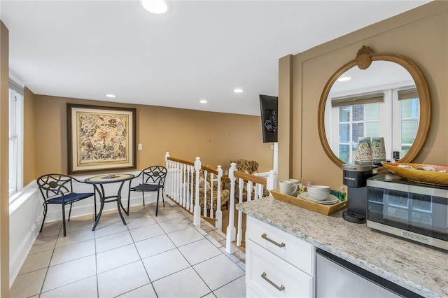 sitting room with light tile patterned floors