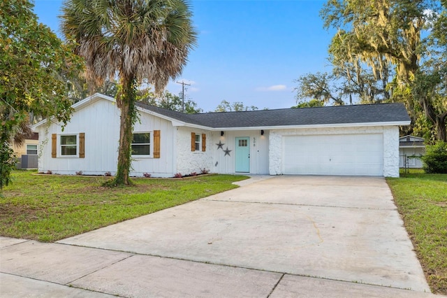 508 Brooker Rd, Brandon, FL 33511 - single story home featuring a garage, driveway, cooling unit, and a front lawn