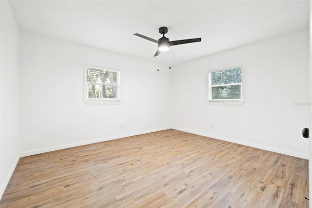 508 Brooker Rd, Brandon, FL 33511 - unfurnished room featuring a ceiling fan, baseboards, light wood-type flooring, and a wealth of natural light