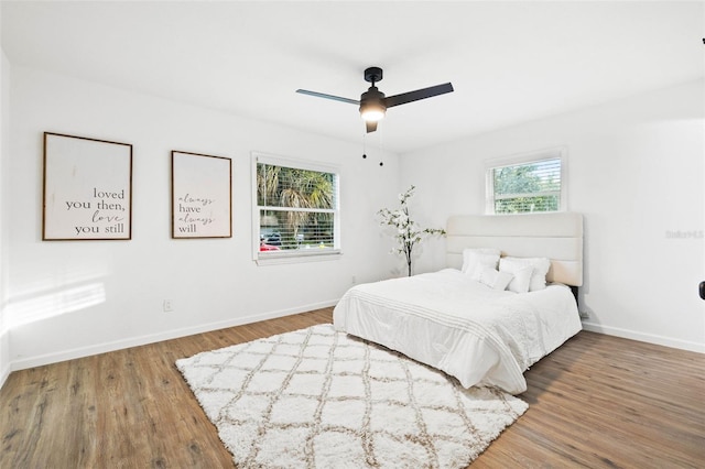 508 Brooker Rd, Brandon, FL 33511 - bedroom with wood finished floors, baseboards, and ceiling fan