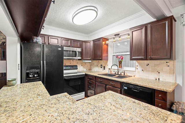 kitchen with sink, decorative backsplash, light stone counters, black appliances, and a textured ceiling