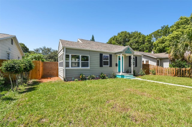 view of front of home with a front yard