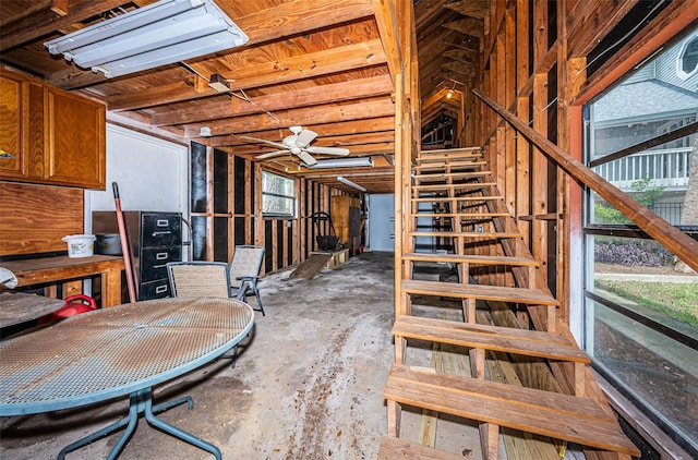 basement with ceiling fan