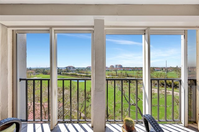 unfurnished sunroom featuring a wealth of natural light