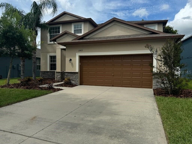 view of front of property featuring a garage