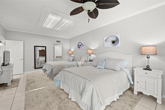 bedroom with crown molding, connected bathroom, light tile patterned floors, and ceiling fan