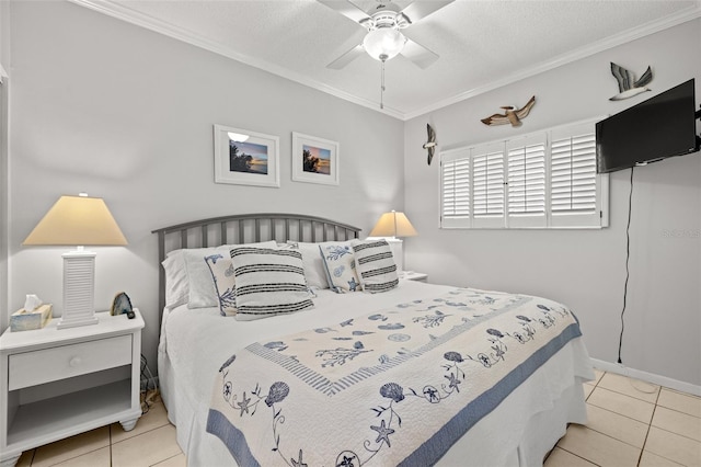 bedroom featuring a textured ceiling, ceiling fan, light tile patterned floors, and crown molding