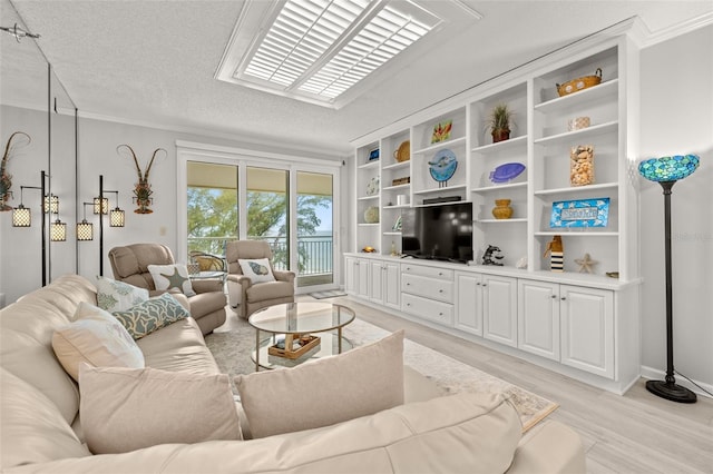 living room featuring crown molding, a textured ceiling, and light wood-type flooring