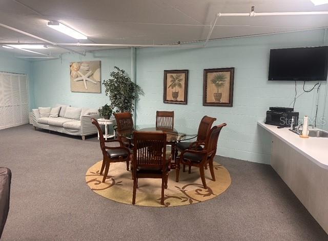 dining room featuring carpet flooring