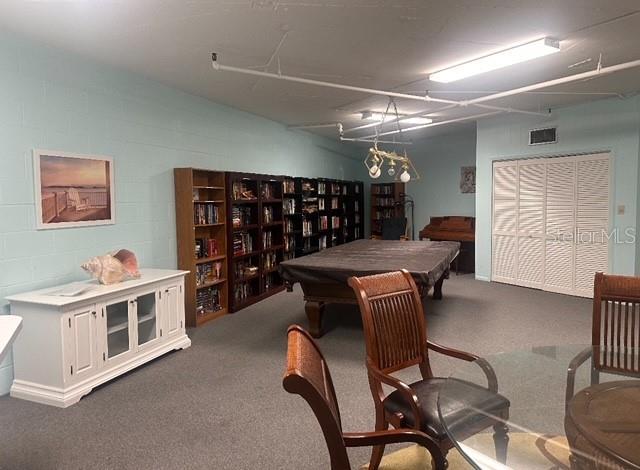 recreation room featuring dark colored carpet and billiards