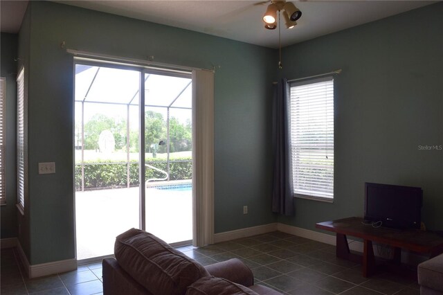 living room with tile patterned flooring