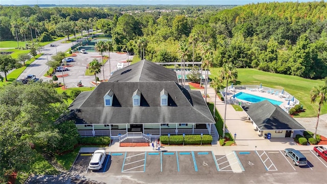 11247 Corey Pavin Ln, San Antonio, FL 33576 - drone / aerial view with a forest view