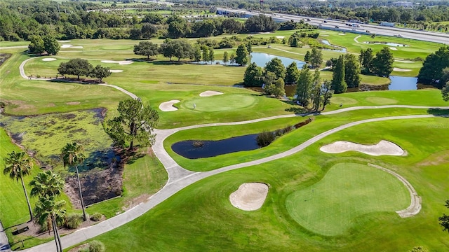 11247 Corey Pavin Ln, San Antonio, FL 33576 - aerial view featuring view of golf course and a water view