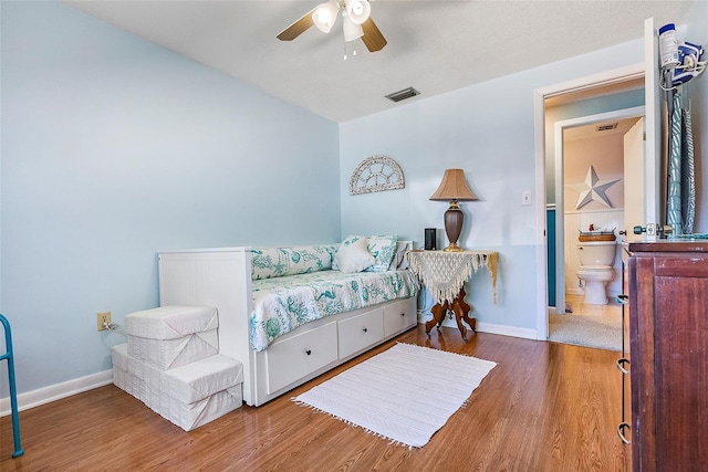 bedroom featuring ceiling fan and hardwood / wood-style flooring