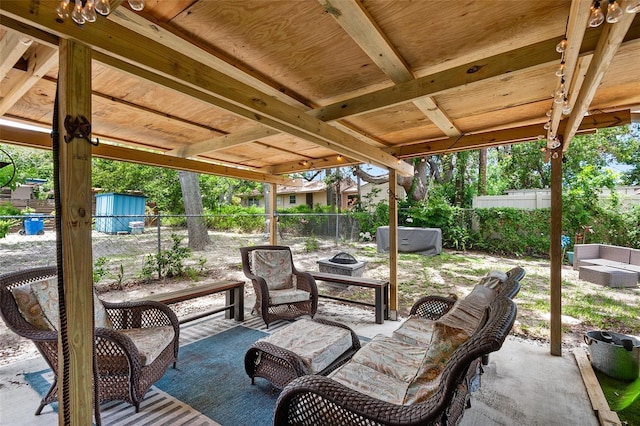 view of patio featuring an outdoor fire pit