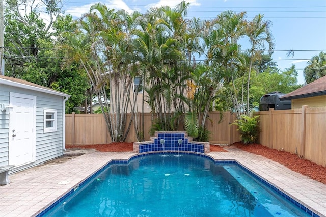 view of swimming pool featuring a patio