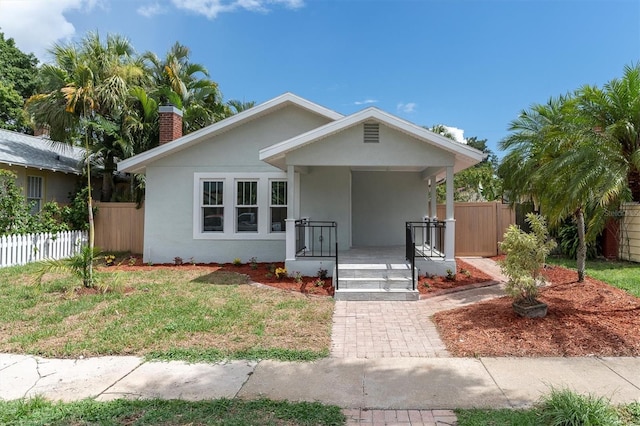 bungalow-style home with a porch