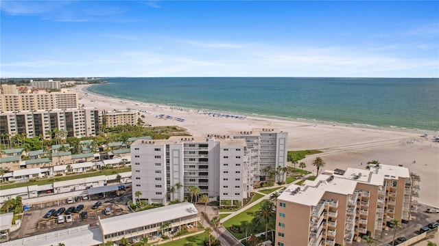 aerial view featuring a water view and a beach view