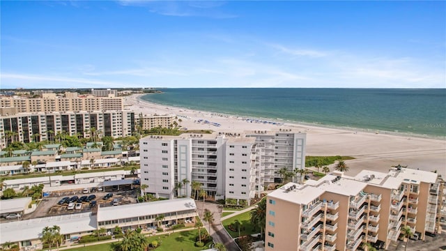 aerial view featuring a view of the beach and a water view