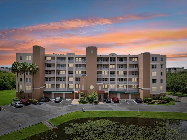 view of outdoor building at dusk