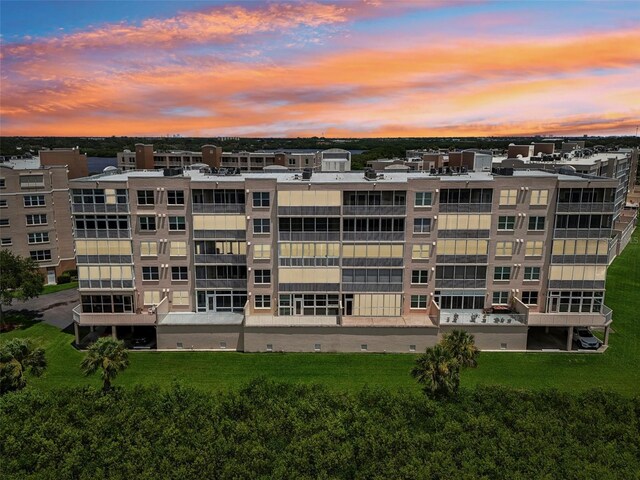 view of outdoor building at dusk