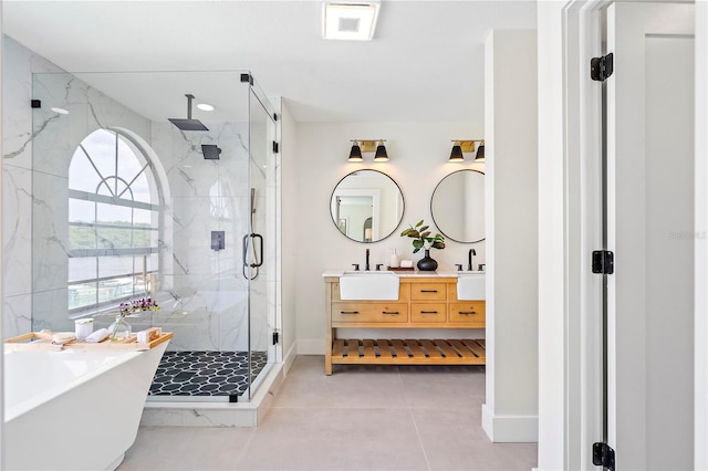 bathroom with vanity, independent shower and bath, and tile patterned flooring