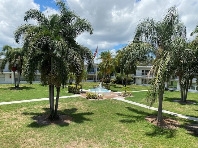 view of home's community featuring a yard