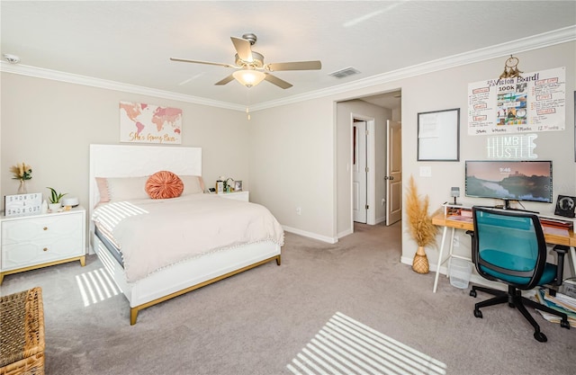 carpeted bedroom with ceiling fan and crown molding