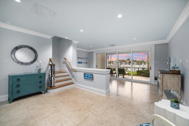 living room with light tile patterned flooring and crown molding