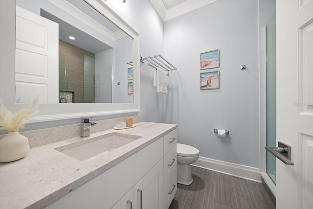 bathroom featuring vanity, an enclosed shower, tile patterned flooring, and toilet