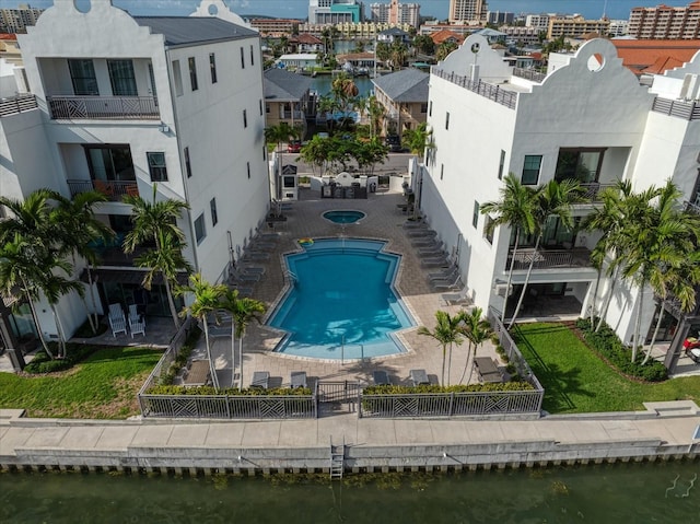 birds eye view of property with a water view