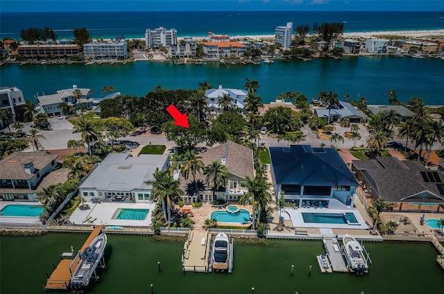 birds eye view of property featuring a water view