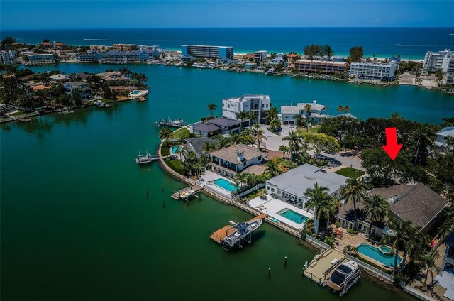 drone / aerial view with a water view