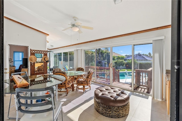 sunroom featuring ceiling fan