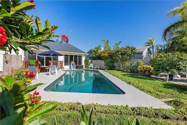 view of swimming pool featuring a patio