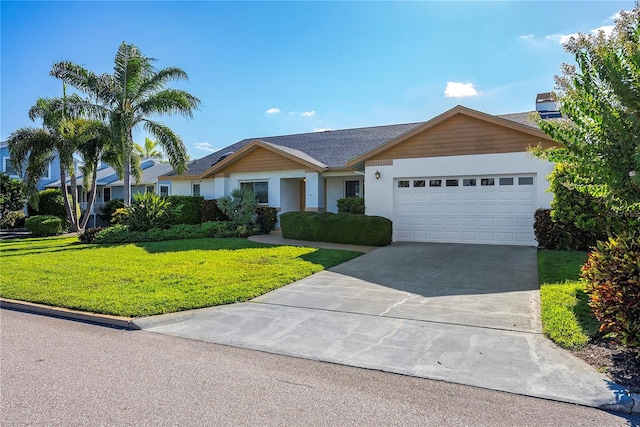 ranch-style home with a garage and a front yard