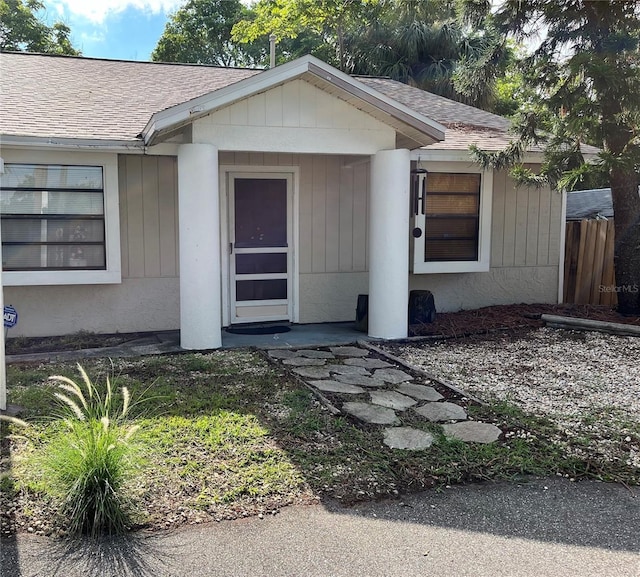 view of front of property with roof with shingles