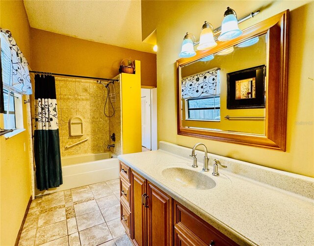 bathroom with tile patterned floors, vanity, and shower / bathtub combination with curtain