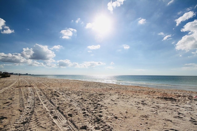 property view of water featuring a view of the beach