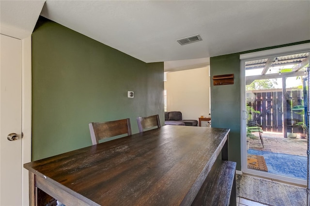 dining room with tile patterned floors