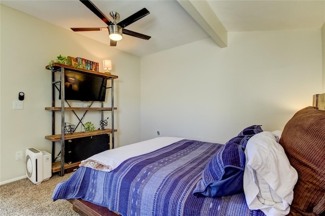 bedroom with carpet, vaulted ceiling with beams, and ceiling fan