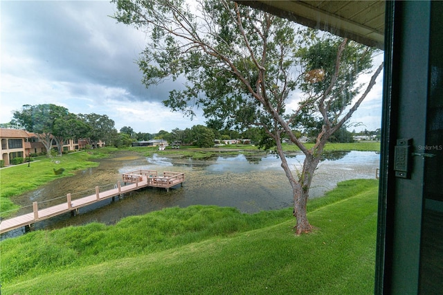 view of dock with a water view