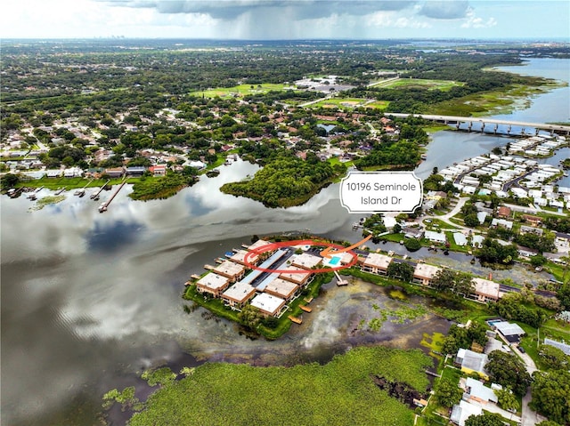 drone / aerial view with a water view