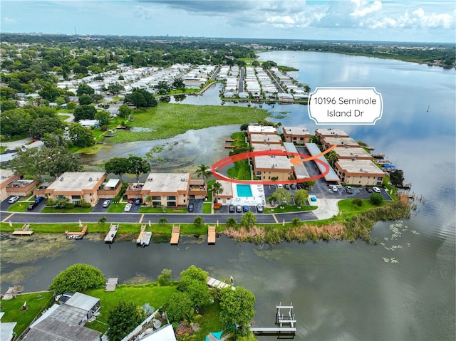 birds eye view of property featuring a water view