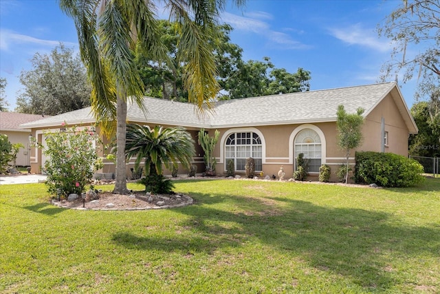 ranch-style house with a front yard