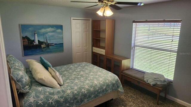 bedroom featuring a closet and ceiling fan