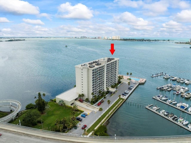 birds eye view of property featuring a water view