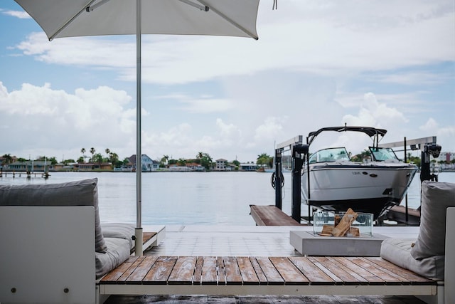 440 64th Ave, St Pete Beach, FL 33706 - dock area featuring a water view and boat lift